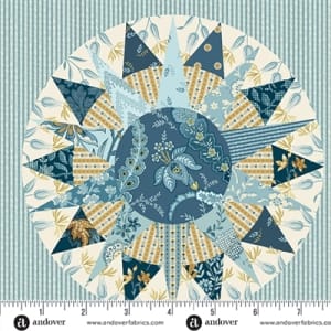 BEACH HOUSE COLLECTION 108 Wide Mariner's Compass AW-1194-LB by Laundry Basket Quilts shows a picture of the cream colored 108" wide backing fabric from the quilt fabric collection.