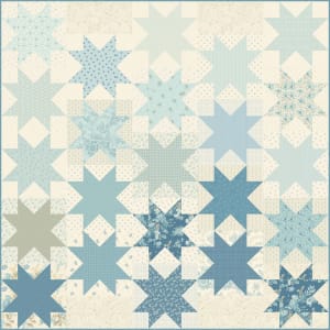 SEWING BIRD Sewing Star Quilt Kit (TOP)  by Laundry Basket Quilts shows a star quilt with vertical rows of stars, with each row being in shades of blue.