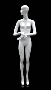 Abstract female mannequin in glossy white fiberglass with arms crossed in front and a round glass base.