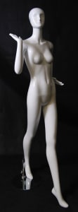 Tall Terry abstract female mannequin in a high gloss white fiberglass finish standing on a stable metal base with ankle and foot rods.