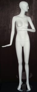 Tall Terry abstract female mannequin in a high gloss white fiberglass finish standing on a stable metal base with ankle and foot rods.