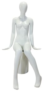 Matte white fiberglass female egghead mannequin in an elegant seated pose, ideal for high-end retail apparel display.