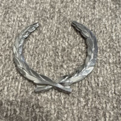 1991 cadillac deville crest emblem-Reef
