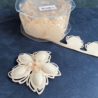 Aurelia Ivory Confetti Ribbon Flower Roll with leaf design