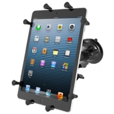 RAM X-Grip suction cup tablet mount with adjustable arm and spring-loaded cradle, holding a 11" tablet securely on a vehicle windshield.