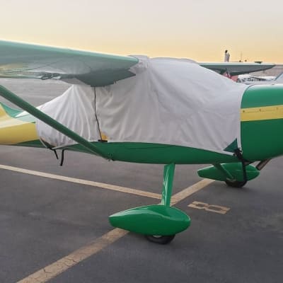 Glasair Glastar or Sportsman 2+2 aircraft with custom-fitted Silver Sunbrella canopy and fuselage cover.