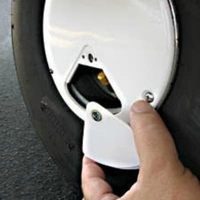 Hubba Hubba Caps Gen 2 installed on aircraft wheels, featuring easy access door, stainless steel fasteners, and low-drag, scratch-resistant design.