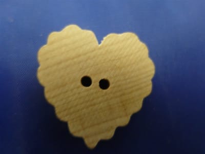 BU-RH CLOTHING BUTTONS RUFFLE HEART 1-1/8" HEIGHT X 1" WIDTH X 3/16" THICK