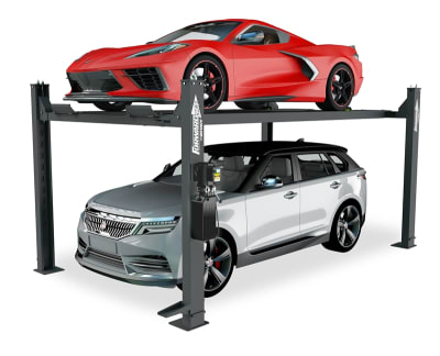 Forward EFP9 9,000 lb storage lift holding a red sports car above a silver SUV, showcasing extra height and strength for larger vehicles in a freestanding setup.