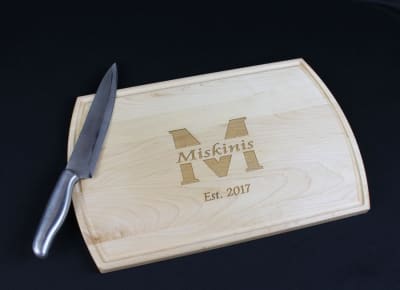 Choose and name and get it engraved for free on solid maple cutting board