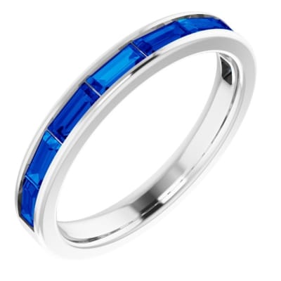 This 14k white gold sapphire stackable ring features natural blue sapphires.