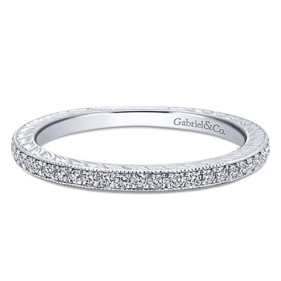 14k white gold diamond stackable ring with diamond accents.