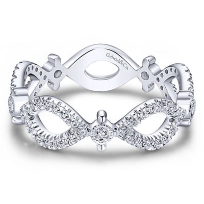 This 14k white gold diamond stackable ring features one third carats of diamonds in an infinity swirl.