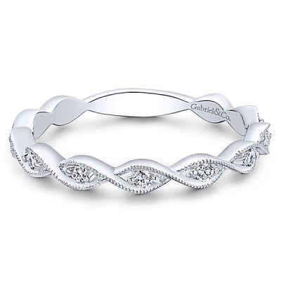 This 14k white gold diamond stackable ring features milgrain twists.