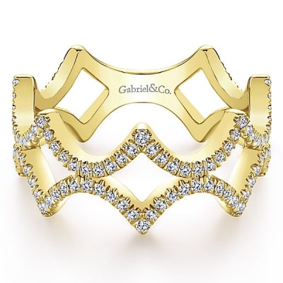 This 14k yellow gold stackable ring features 0.38 carats of diamonds.