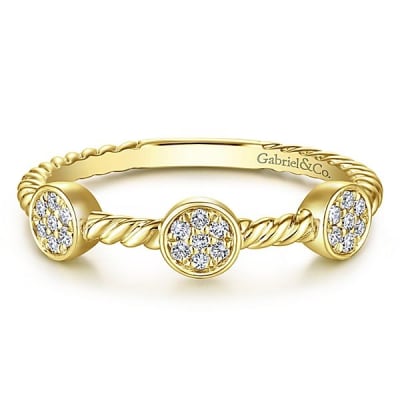 Diamond sections fill this 14k yellow gold stackable ring.