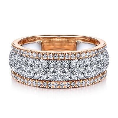 A 14k rose gold and 14k white gold diamond ring with over 1 carats of diamonds.