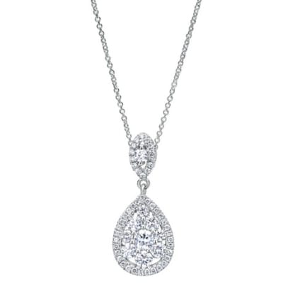 This beautiful and delicate 14k white gold pear shape diamond necklace shimmers with nearly 1 carat of top quality round diamonds.