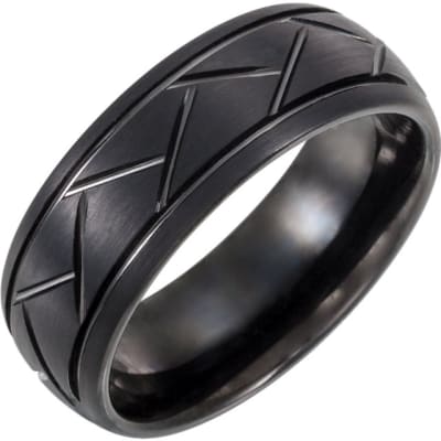 This black tungsten men's wedding band is patterned.