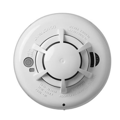 The DSC WS4936 Wireless Smoke Detector Sensor.
