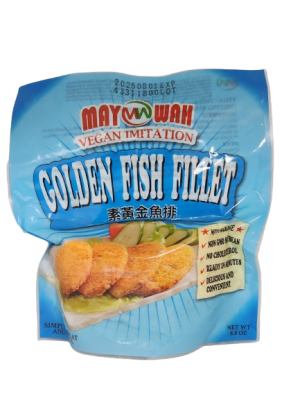 A delectable vegan golden fish fillet served crispy and golden brown, paired with a side of fresh greens and lemon wedges, perfect for a plant-based seafood alternative.