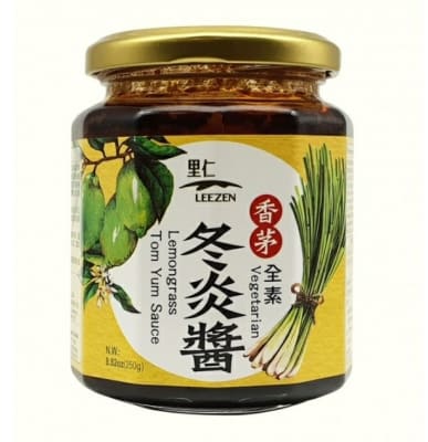 A bottle of vegan lemongrass tom yum sauce, offering a tangy and aromatic flavor perfect for soups, stir fries, and other Thai inspired dishes
