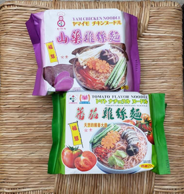 A pack of vegan tomato instant fine noodles, offering a quick and flavorful plant based noodle option for soups, stir fries, and easy meals