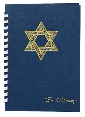 leatherette cover with 15 ring plastic comb binding.