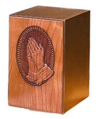 cremation urn praying hands surrounded by solid bronze.
8" h x 5 1/2" w x 6" d.
208 cubic inches.