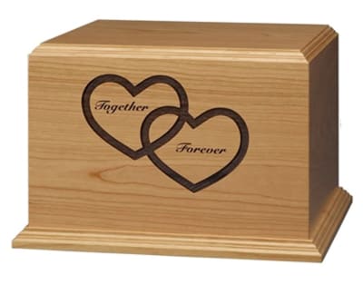 walnut with maple hearts cremation urn
removable inside divider.
dimensions: 10 1/4" x 11 1/2" x 7 3/4"
450 cubic inches.