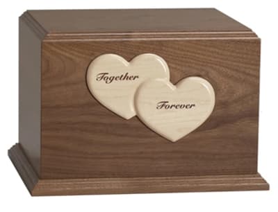 walnut with maple hearts. cremation urn
removable inside divider.
dimensions: 10 1/4" x 11 1/2" x 7 3/4"
450 cubic inches.