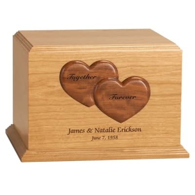nicheable cremation urn 
solid natural cherry with bubinga hearts.
dimensions: 8 1/4" x 10 1/2" x 8 1/4"
425 cubic inches.