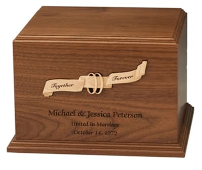 ribbon & rings companion cremation urn
walnut with maple inlay.
dimensions: 10 1/4" x 11 1/2" x 7 3/4"
450 cubic inches.