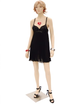 Suze female mannequin in a natural fleshtone finish with realistic facial features and a sturdy metal base.
