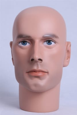 Flesh-toned realistic male display head with blue eyes, painted facial details, and extended neck for hat and accessory display