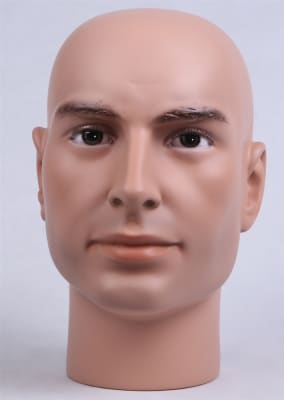 Realistic flesh-colored male display head with brown eyes fiberglass construction and flat base for headgear display