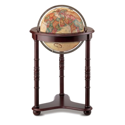 The Westminster 16-inch world globe is a powerful statement piece designed to enrich its surroundings. This decorative floor globe features a stunning 16-inch antique-ocean globe with vibrant colors that are set off beautifully by a solid hardwood base fi