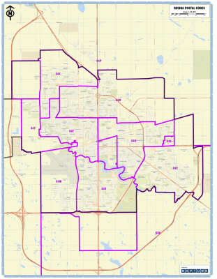 Detailed 28x36 inch wall map of Regina, Saskatchewan showing postal code boundaries and major city streets.