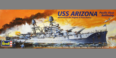 Box art illustration from 1950s by Revell of the Battleship USS Arizona on this reissued model kit of the iconic ship with explosions and deep orange sky depicting the attack on them at Pearl Harbor.
