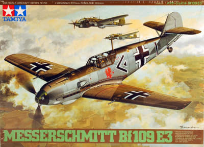 Box art illustration of WWII German fighter, Bf 109 E-3 in a dogfight high in the sky.