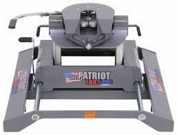 The B&W Patriot 18K Slider 5th Wheel Hitch (RVK3270) is a rail-mounted slider hitch designed to provide 12 inches of movement for the additional clearance needed when towing with a short-bed truck.