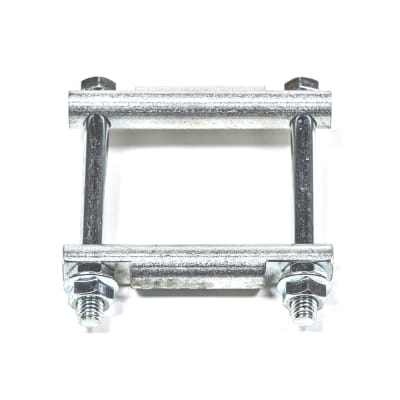 The Blue Ox Single Pull Immobilizer (BX88371), a trailer hitch anti-rattle bracket designed to work with a 2-inch receiver. It eliminates noise and sway from hitch-mounted accessories by creating a tighter, more secure connection.