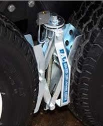 The BAL Deluxe Wheel Chock, model 28005, is a scissor-type locking chock designed for use with tandem-axle trailers and RVs. It works by fitting between the tires and applying opposing force to prevent the trailer from shifting or rolling.