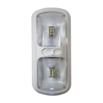 The Arcon 20670 Double LED Euro Light. It is a 12-volt, bright white, double-lens interior light often used in RVs, campers, and trailers. The light is energy-efficient, produces minimal heat, and features an on/off switch.