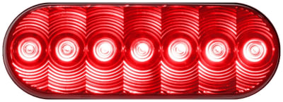The Peterson Manufacturing Trailer Light Stop Turn Tail LED with Grommet, VKR-7 is an oval-shaped, 7-diode LED light intended for use as a combination stop, turn, and tail light. It is suitable for vehicles and trailers that are over 80 inches wide.