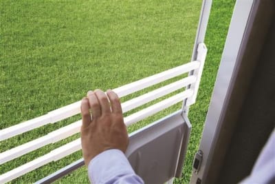 The Camco RV Screen Door Push Bar (White), item number 43977, is an adjustable, corrosion-resistant aluminum bar designed to add sturdiness to your RV screen door and prevent damage.