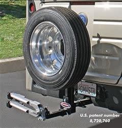 The ROADMASTER RV Spare Tire Mount Carrier (part number 195225-S or RM-195225) is a receiver-hitch-mounted carrier designed for motorhomes, allowing you to carry a spare tire and still use the receiver for towing or accessories.