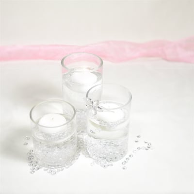 Blooms in diamond drops floating candle centerpiece