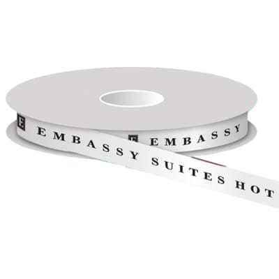 Embassy Suites custom-printed 5/8" wide, white double face satin ribbon with black logo. Price is per roll/100 yards, #1221733.