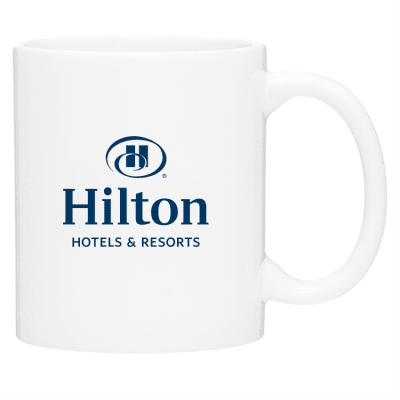 Hilton 11-ounce C-handle white ceramic coffee mug with blue Hilton logo.